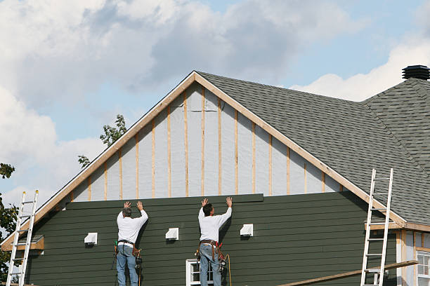 Professional Siding Contractor technician working in Colfax, NC